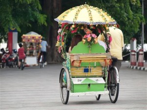 Typisches Fortbewegungsmittel "Becak" - Indonesien